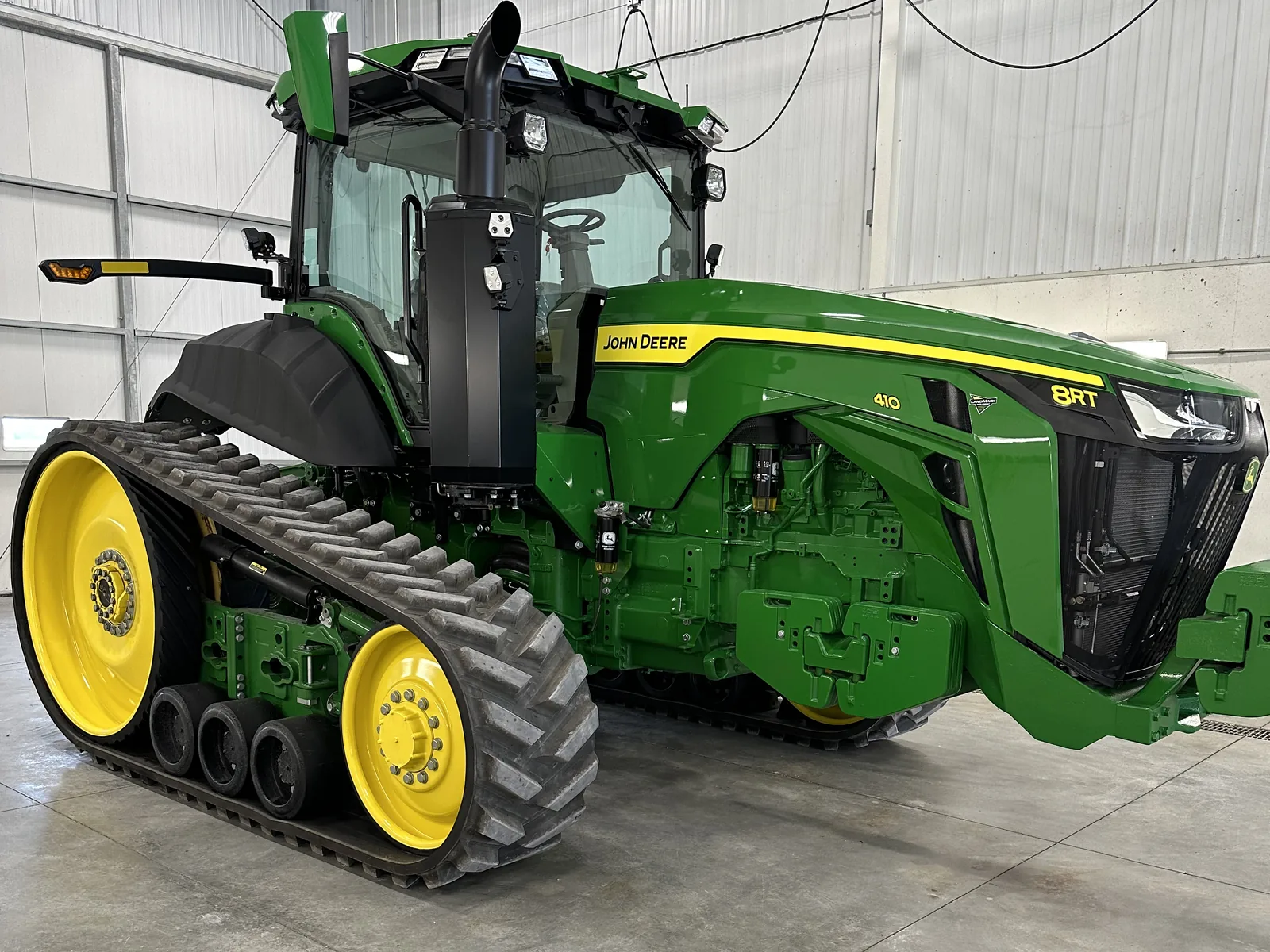 John Deere track tractor after paint polishing and finish restoration