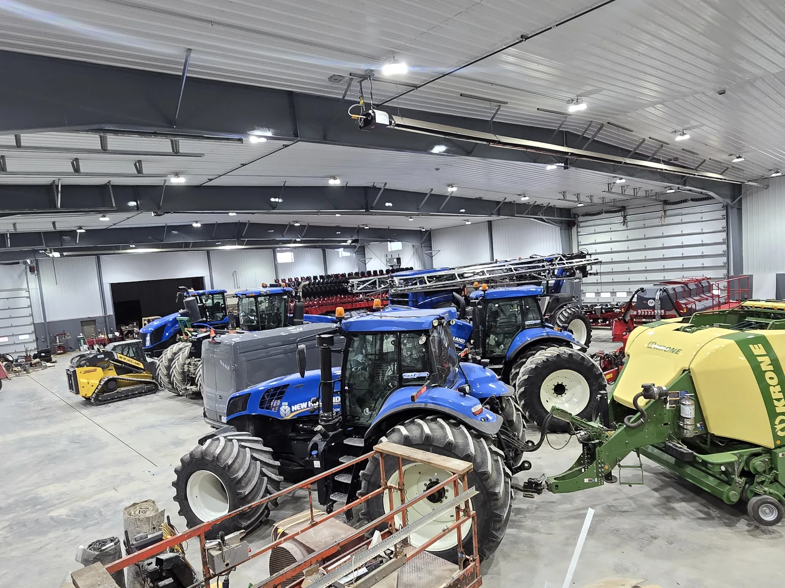 Agricultural machines lined up in the shop during preparation and preservation work